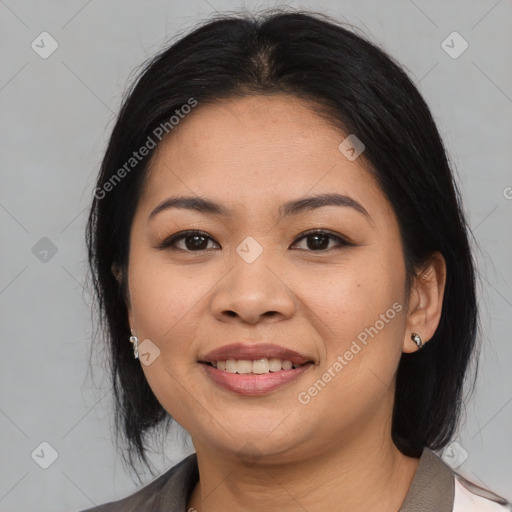 Joyful asian young-adult female with medium  black hair and brown eyes