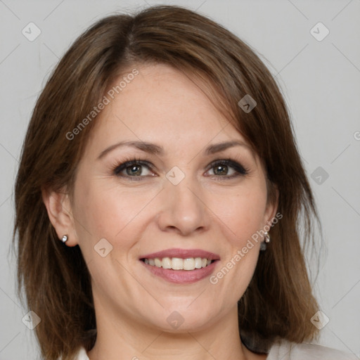 Joyful white adult female with medium  brown hair and grey eyes