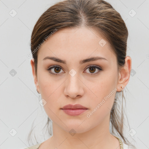 Neutral white young-adult female with medium  brown hair and brown eyes