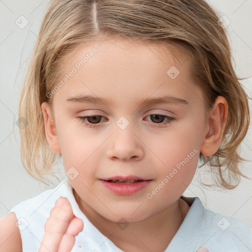 Joyful white child female with medium  brown hair and brown eyes