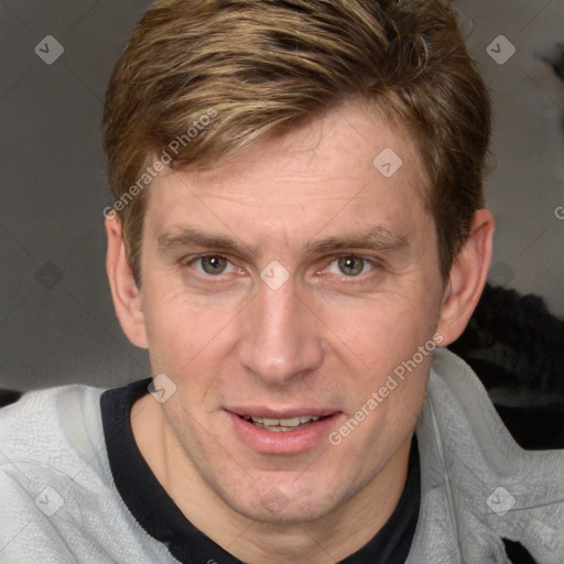 Joyful white adult male with short  brown hair and brown eyes