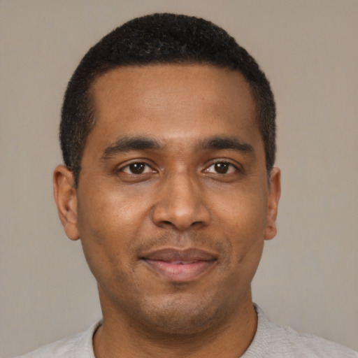 Neutral black young-adult male with short  black hair and brown eyes