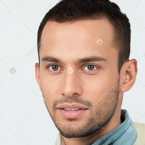 Neutral white young-adult male with short  brown hair and brown eyes