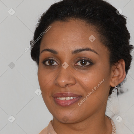 Joyful black young-adult female with short  brown hair and brown eyes