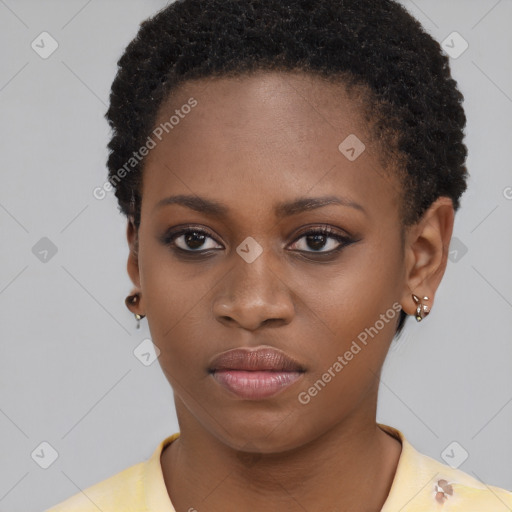 Neutral black young-adult female with short  brown hair and brown eyes