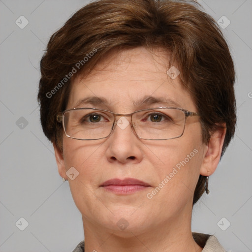 Joyful white adult female with short  brown hair and grey eyes