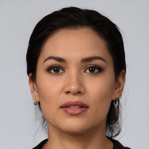 Neutral latino young-adult female with medium  black hair and brown eyes