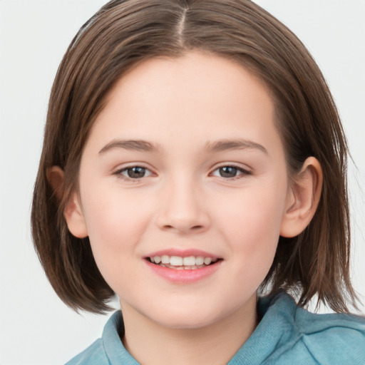 Joyful white child female with medium  brown hair and brown eyes