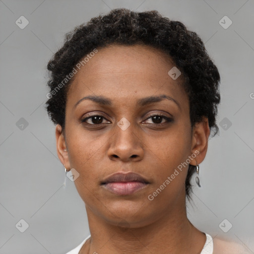 Neutral black young-adult female with short  brown hair and brown eyes