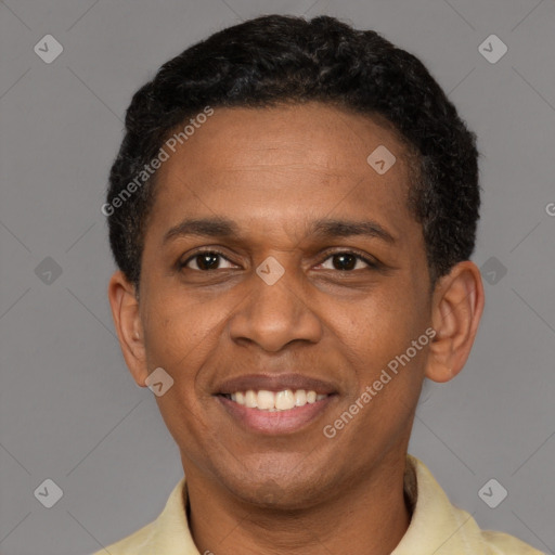 Joyful latino young-adult male with short  brown hair and brown eyes