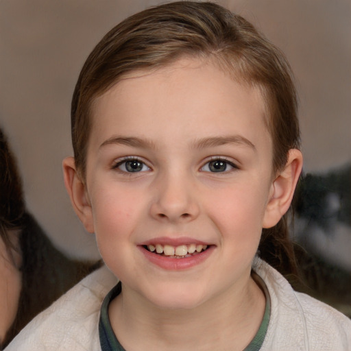 Joyful white child female with medium  brown hair and brown eyes