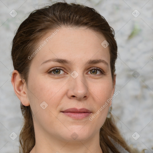 Joyful white young-adult female with medium  brown hair and green eyes