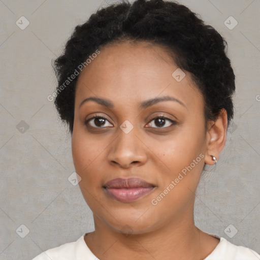 Joyful black young-adult female with short  brown hair and brown eyes