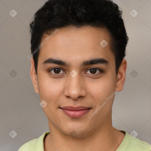 Joyful latino young-adult male with short  brown hair and brown eyes