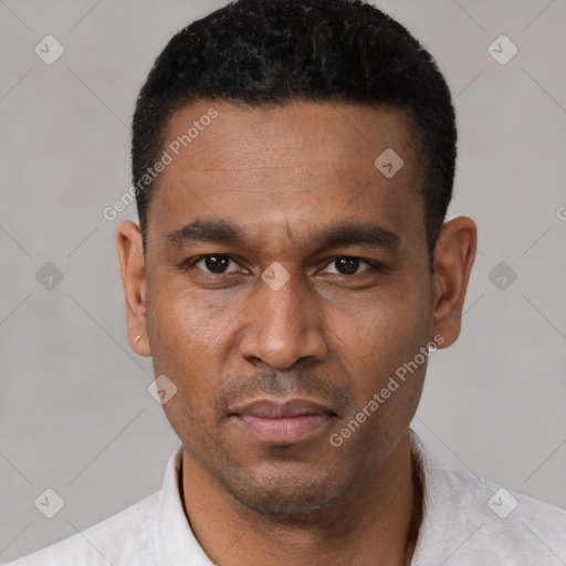 Neutral latino young-adult male with short  black hair and brown eyes