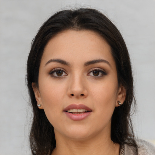 Neutral asian young-adult female with long  brown hair and brown eyes