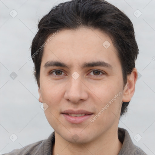 Joyful white young-adult male with short  brown hair and brown eyes