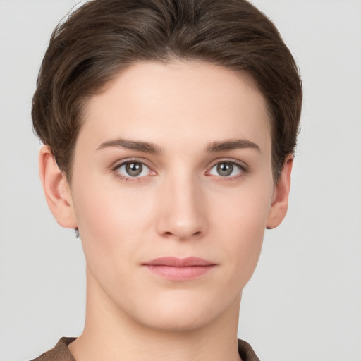 Neutral white young-adult female with short  brown hair and brown eyes