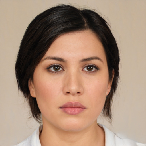 Neutral asian young-adult female with medium  brown hair and brown eyes