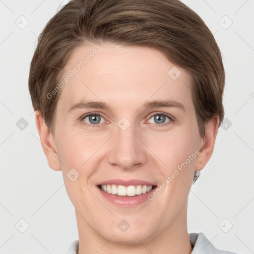 Joyful white young-adult female with short  brown hair and grey eyes