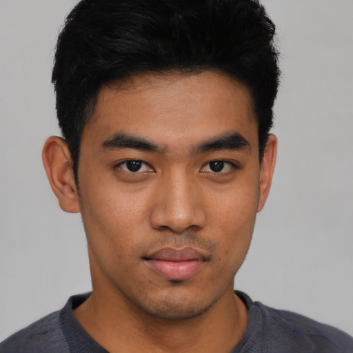 Neutral asian young-adult male with short  black hair and brown eyes