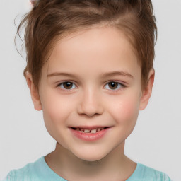 Joyful white child female with short  brown hair and brown eyes