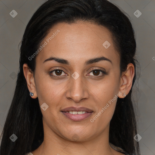 Joyful latino young-adult female with long  brown hair and brown eyes