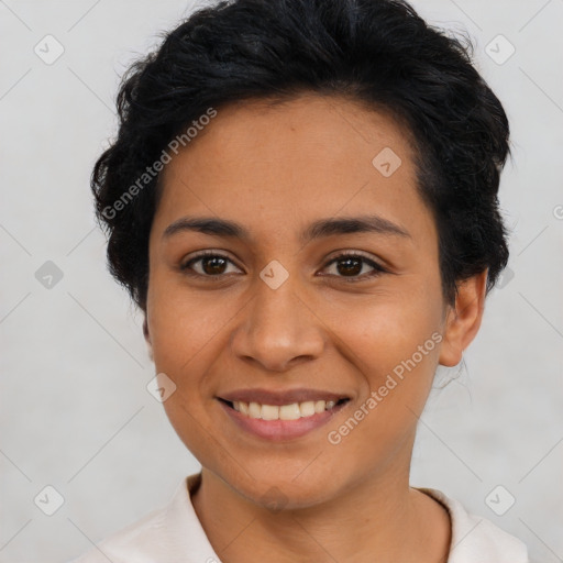 Joyful latino young-adult female with short  black hair and brown eyes