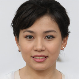 Joyful asian young-adult female with short  brown hair and brown eyes