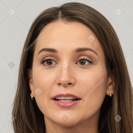 Joyful white young-adult female with long  brown hair and brown eyes