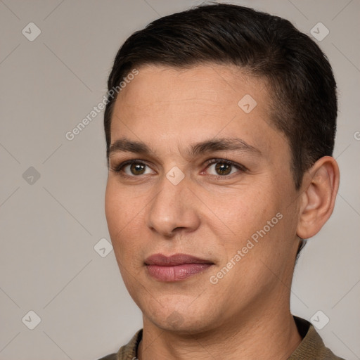 Joyful white adult male with short  brown hair and brown eyes