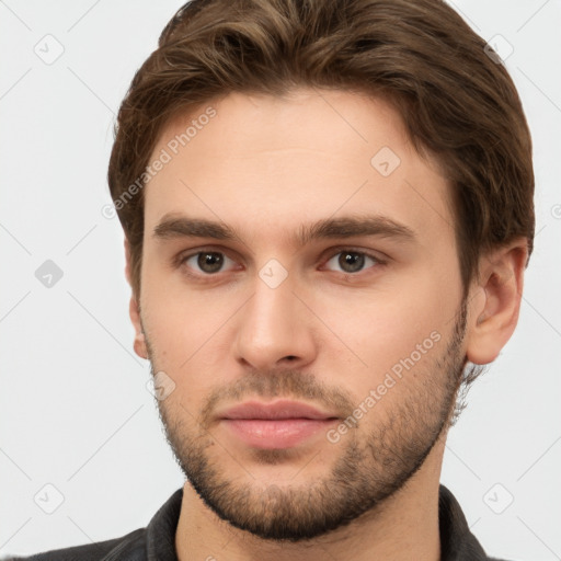 Neutral white young-adult male with short  brown hair and brown eyes