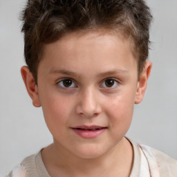 Joyful white child male with short  brown hair and brown eyes