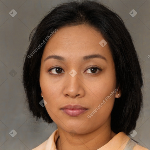 Neutral asian young-adult female with medium  brown hair and brown eyes