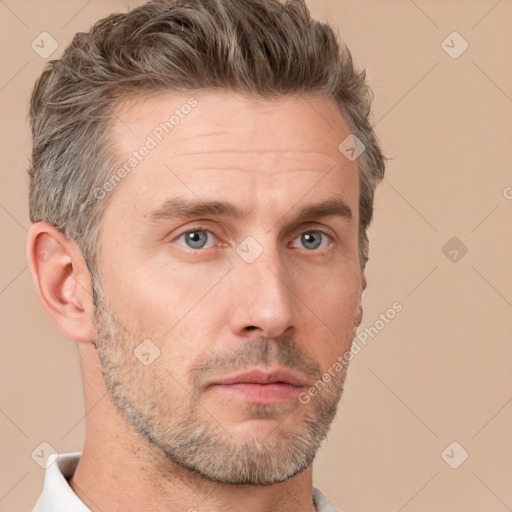 Neutral white adult male with short  brown hair and brown eyes