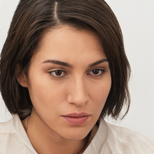 Neutral white young-adult female with medium  brown hair and brown eyes