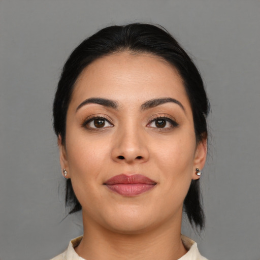 Joyful asian young-adult female with medium  brown hair and brown eyes