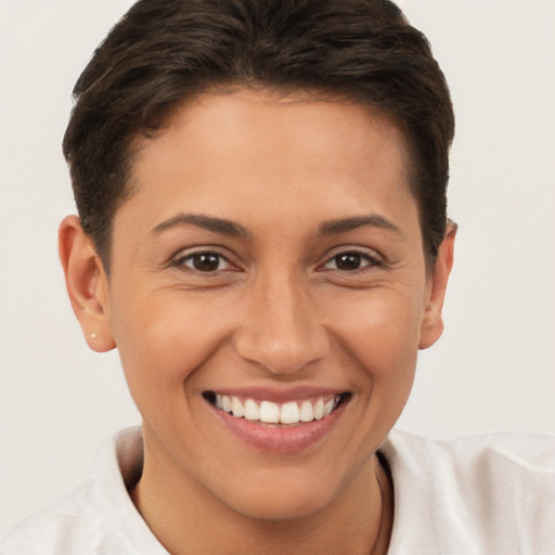 Joyful white young-adult female with short  brown hair and brown eyes