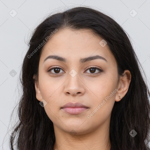 Neutral latino young-adult female with long  brown hair and brown eyes