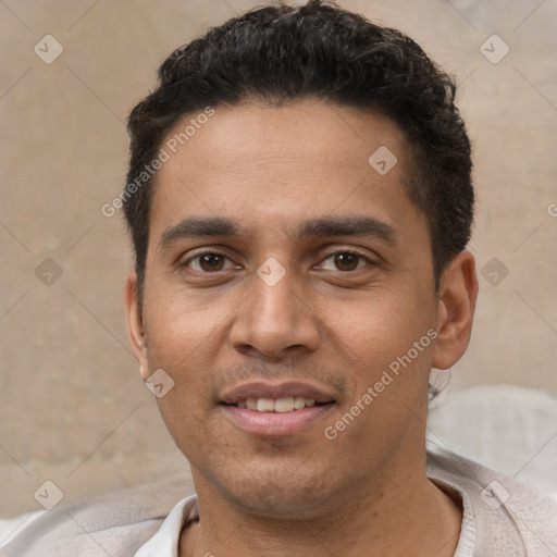 Joyful white young-adult male with short  black hair and brown eyes