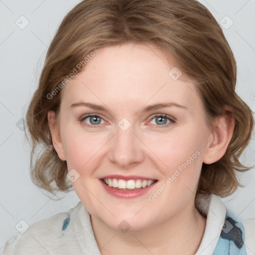 Joyful white young-adult female with medium  brown hair and blue eyes