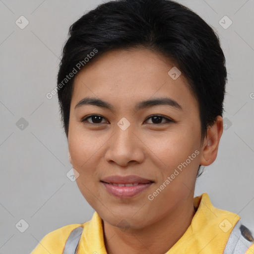 Joyful asian young-adult female with short  brown hair and brown eyes