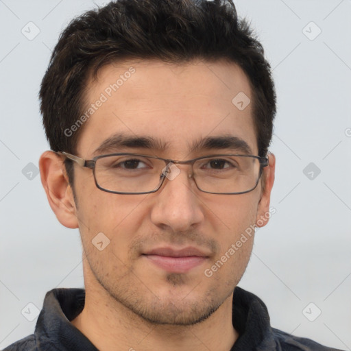 Joyful white adult male with short  brown hair and brown eyes