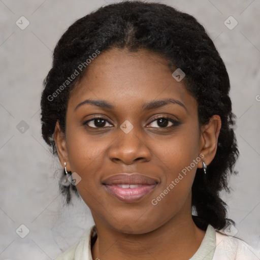 Joyful black young-adult female with medium  black hair and brown eyes