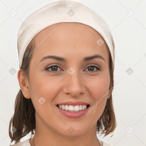 Joyful white young-adult female with medium  brown hair and brown eyes