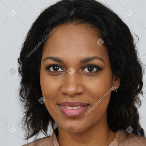 Joyful black young-adult female with long  brown hair and brown eyes