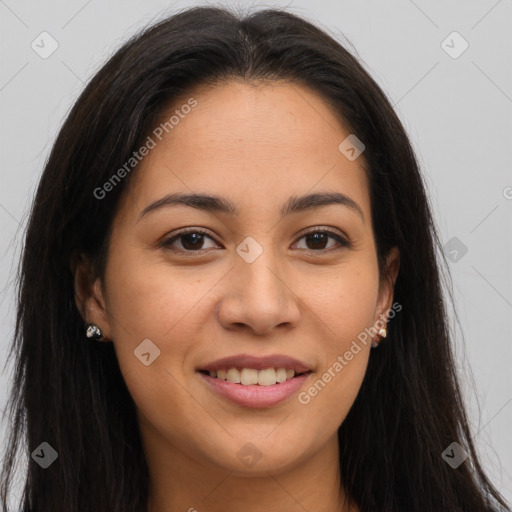 Joyful latino young-adult female with long  brown hair and brown eyes