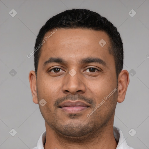 Neutral latino young-adult male with short  black hair and brown eyes