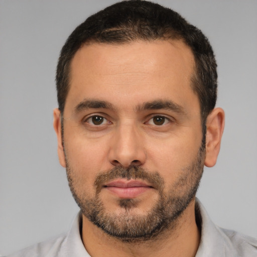 Neutral white adult male with short  black hair and brown eyes