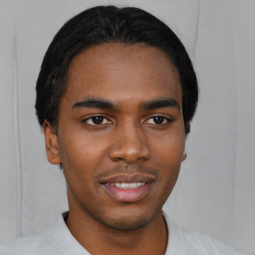 Neutral black young-adult male with short  black hair and brown eyes